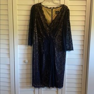 Navy blue faux wrap lace dress with tan underlay